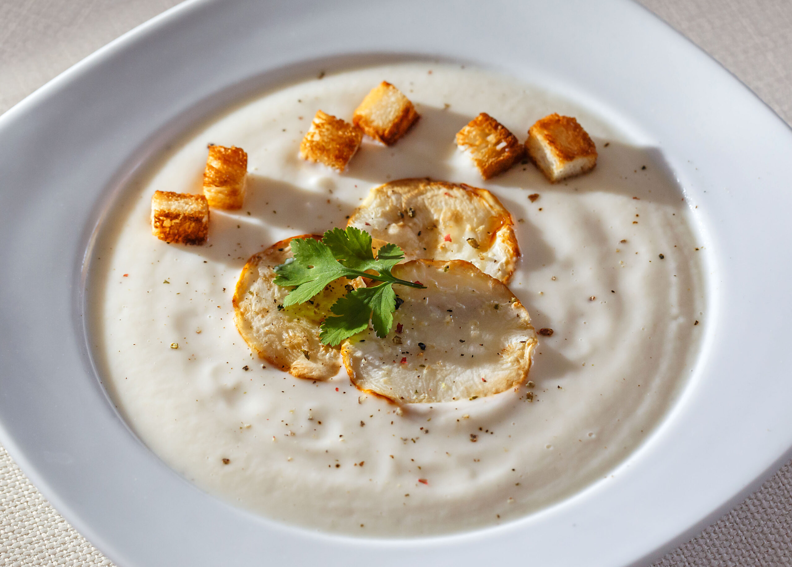 Celery soup with croutons